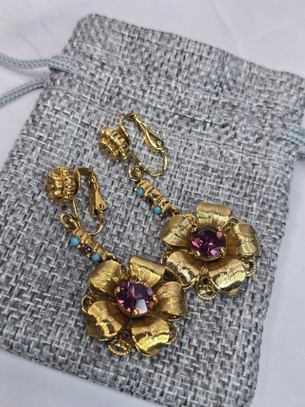 Gold Tone Embellished Floral Dangle Clip Earrings